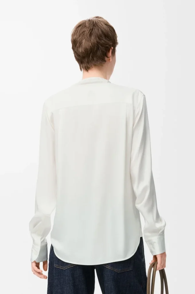 Blusa de seda blanca