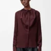 Blusa de seda burdeos