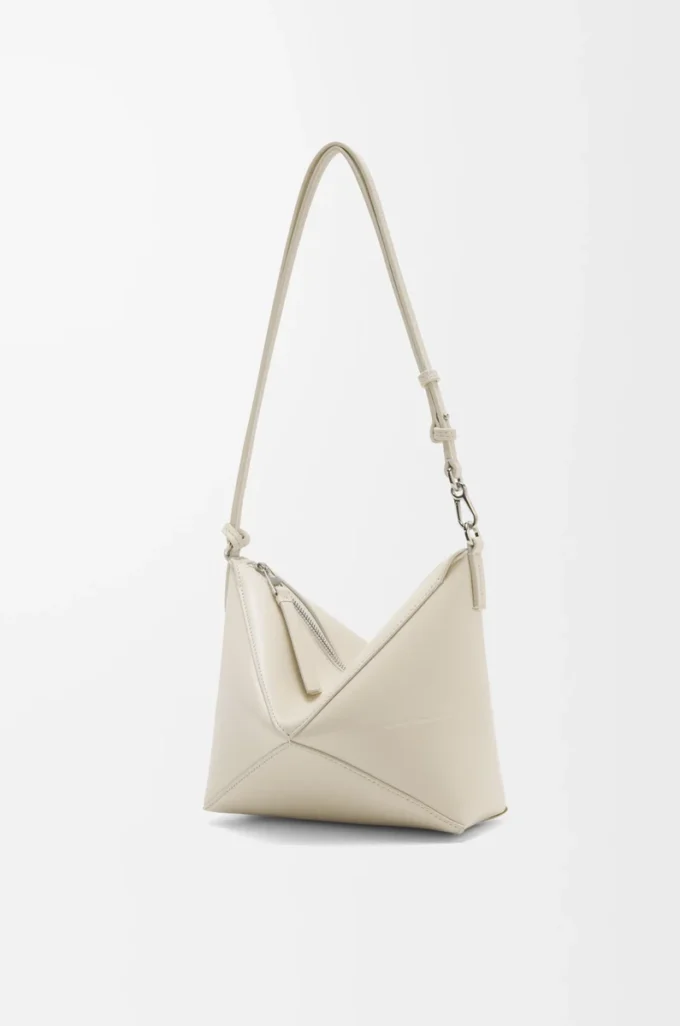 Bolsa Puzzle Fold en piel de becerro napa brillante Sea Salt Bolsa Puzzle Fold en piel de becerro napa brillante Sea Salt