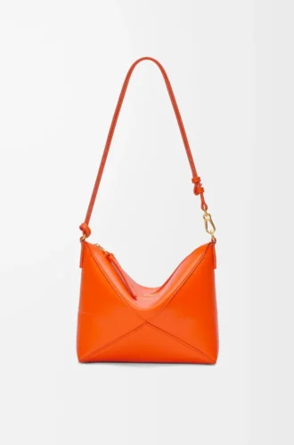 Bolsa Puzzle Fold en piel de becerro napa brillante Vivid Orange