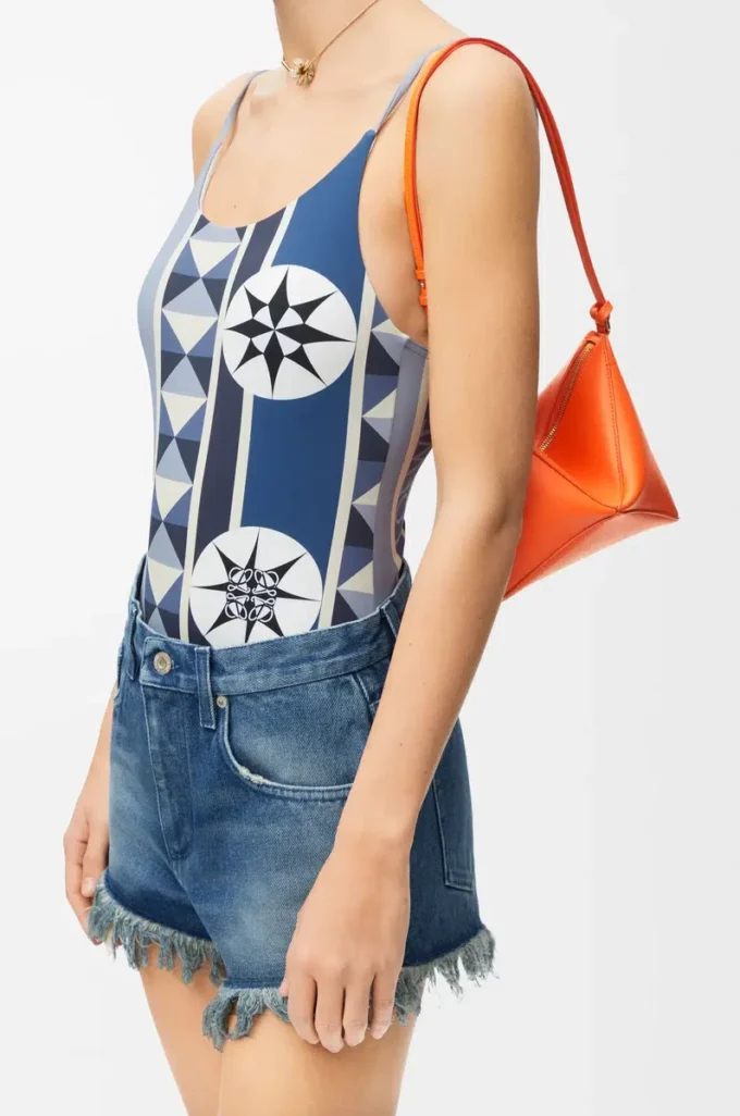 Bolsa Puzzle Fold en piel de becerro napa brillante Vivid Orange Bolsa Puzzle Fold en piel de becerro napa brillante Vivid Orange