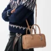 Bolso Amazona 23 en piel de becerro granulada suave color moca Bolso Amazona 23 en piel de becerro granulada suave color moca