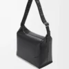 Bolso bandolera Cubi en piel de becerro suave y flexible y jacquard negro Bolso bandolera Cubi en piel de becerro suave y flexible y jacquard negro