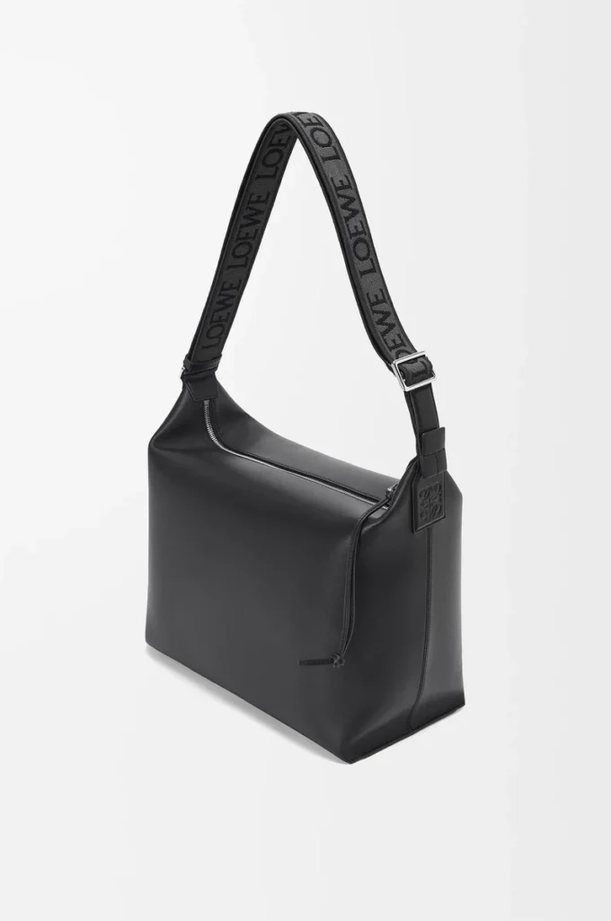 Bolso bandolera Cubi en piel de becerro suave y flexible y jacquard negro Bolso bandolera Cubi en piel de becerro suave y flexible y jacquard negro