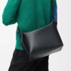 Bolso bandolera Cubi en piel de becerro suave y flexible y jacquard negro Bolso bandolera Cubi en piel de becerro suave y flexible y jacquard negro