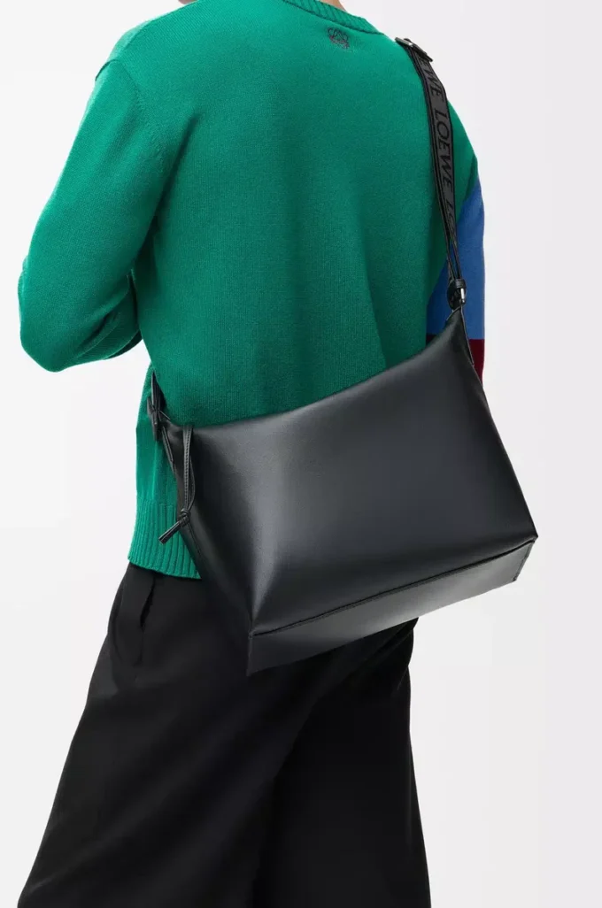 Bolso bandolera Cubi en piel de becerro suave y flexible y jacquard negro Bolso bandolera Cubi en piel de becerro suave y flexible y jacquard negro