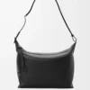 Bolso bandolera Cubi en piel de becerro suave y flexible y jacquard negro Bolso bandolera Cubi en piel de becerro suave y flexible y jacquard negro