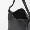 Bolso bandolera Cubi en piel de becerro suave y flexible y jacquard negro Bolso bandolera Cubi en piel de becerro suave y flexible y jacquard negro