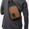 Bolso bandolera Flex en lona y ante Negro/Oro oscuro Bolso bandolera Flex en lona y ante Negro/Oro oscuro