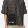 Bolso con cordón en rafia negro Bolso con cordón en rafia negro