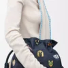 Bolso de mano Flamenco mediano Cats en denim bordado Azul