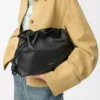 Bolso de mano Flamenco mediano en piel de becerro napa Black Bolso de mano Flamenco mediano en piel de becerro napa Black