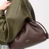Bolso Flamenco mediano en piel de cordero napa suave color castaño oscuro Bolso Flamenco mediano en piel de cordero napa suave color castaño oscuro