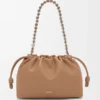 Bolso Flamenco mediano en suave piel de cordero napa color moca Bolso Flamenco mediano en suave piel de cordero napa color moca