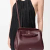 Bolso Madrid mediano en piel de becerro flexible color burdeos oscuro Bolso Madrid mediano en piel de becerro flexible color burdeos oscuro