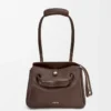 Bolso Madrid pequeño en piel de becerro flexible, color castaño oscuro Bolso Madrid pequeño en piel de becerro flexible, color castaño oscuro