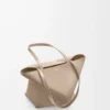 Bolso mediano Puzzle Fold en piel de becerro brillante color arena Bolso mediano Puzzle Fold en piel de becerro brillante color arena