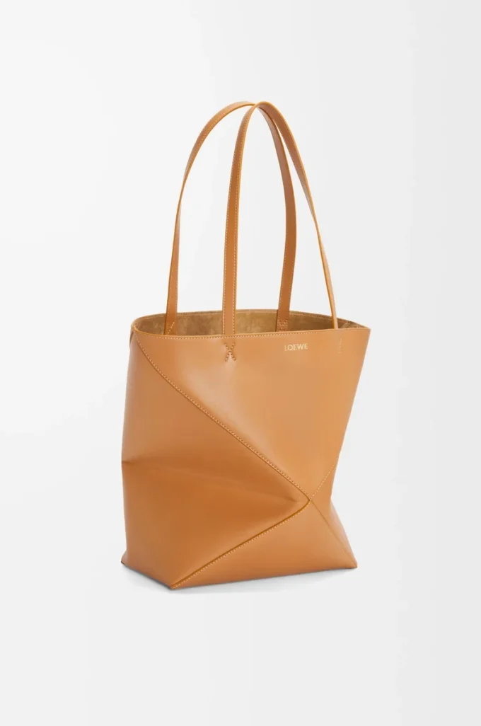 Bolso mediano Puzzle Fold en piel de becerro brillante Warm Desert