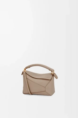 Bolso Mini Puzzle Edge en piel de becerro granulada suave color arena