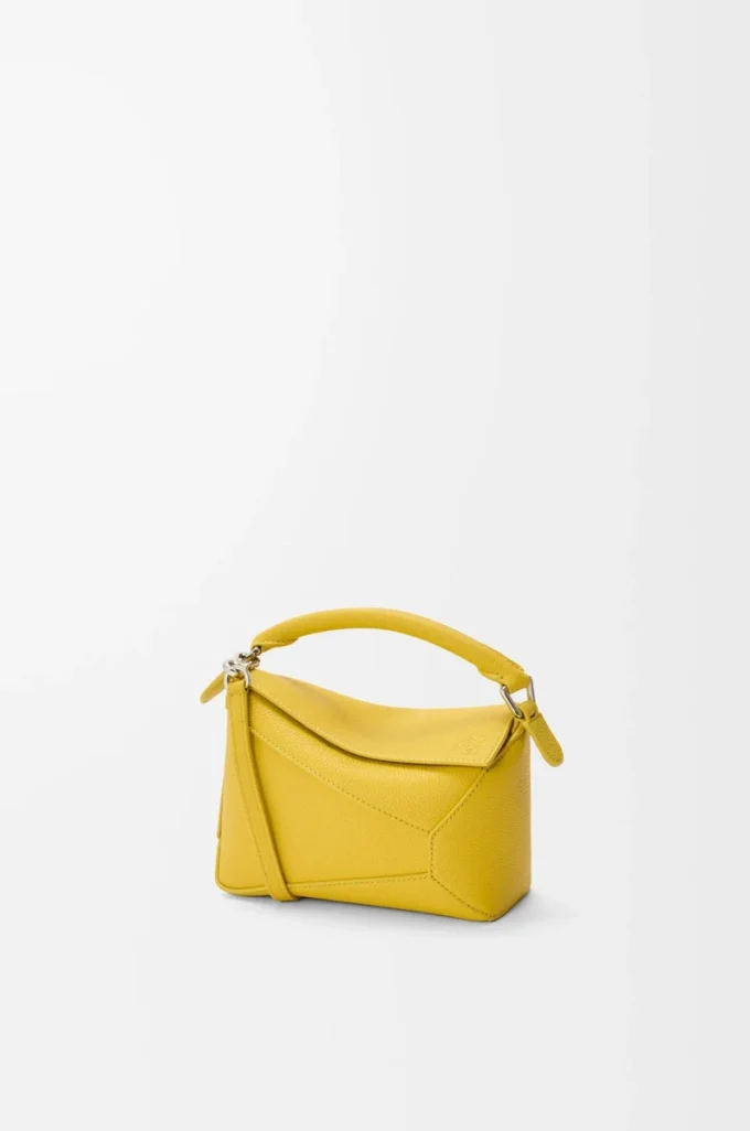 Bolso Mini Puzzle Edge en piel de becerro granulada suave color Dandelion Bolso Mini Puzzle Edge en piel de becerro granulada suave color Dandelion