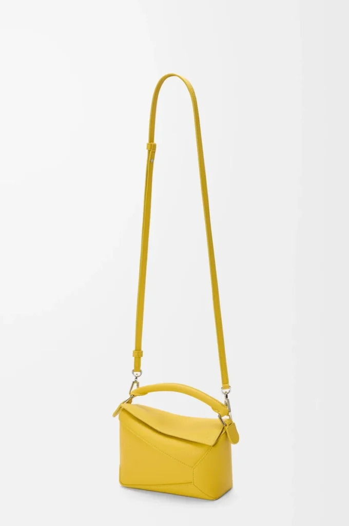Bolso Mini Puzzle Edge en piel de becerro granulada suave color Dandelion Bolso Mini Puzzle Edge en piel de becerro granulada suave color Dandelion