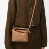 Bolso Mini Puzzle Edge en piel de becerro granulada suave color toffee Bolso Mini Puzzle Edge en piel de becerro granulada suave color toffee