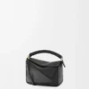 Bolso Mini Puzzle en piel de becerro lisa, color negro Bolso Mini Puzzle en piel de becerro lisa, color negro
