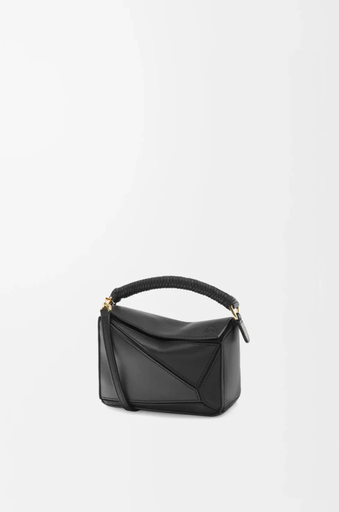 Bolso Mini Puzzle en piel de becerro lisa, color negro Bolso Mini Puzzle en piel de becerro lisa, color negro