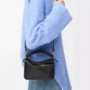 Bolso Mini Puzzle en piel de becerro lisa, color negro Bolso Mini Puzzle en piel de becerro lisa, color negro