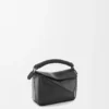 Bolso Mini Puzzle en piel de becerro lisa, color negro Bolso Mini Puzzle en piel de becerro lisa, color negro