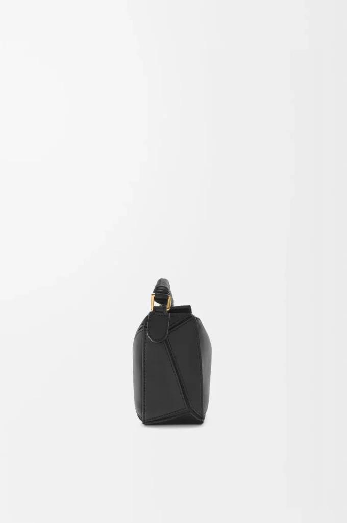 Bolso Mini Puzzle en piel de becerro lisa, color negro Bolso Mini Puzzle en piel de becerro lisa, color negro