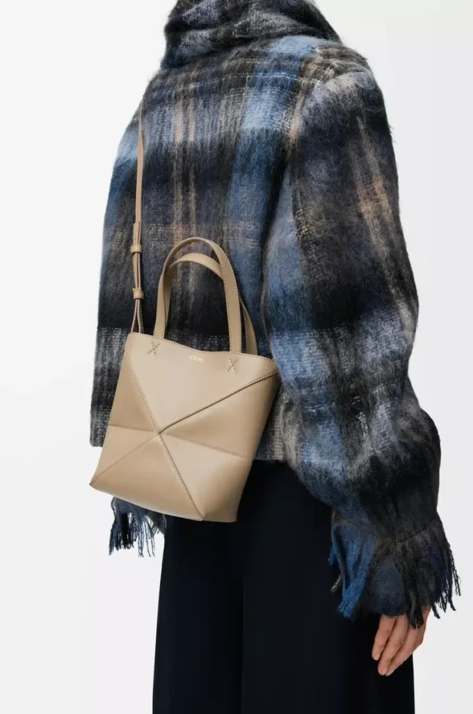 Bolso Mini Puzzle Fold en piel de becerro brillante Sand Bolso Mini Puzzle Fold en piel de becerro brillante Sand