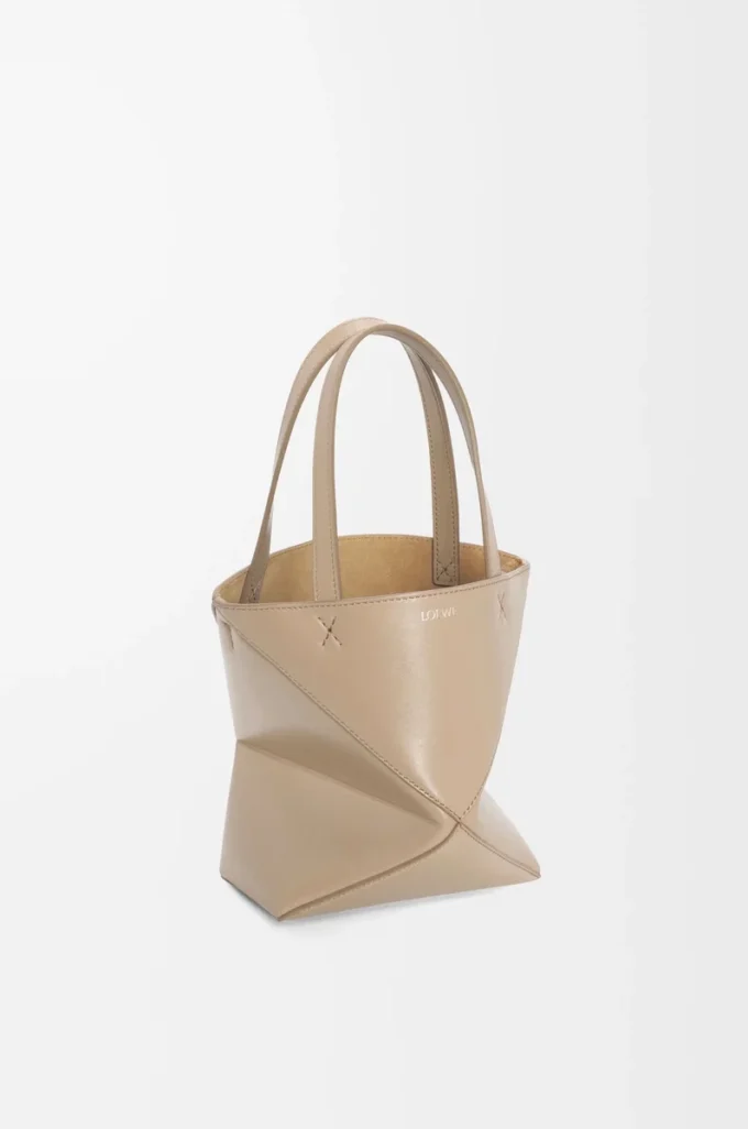 Bolso Mini Puzzle Fold en piel de becerro brillante Sand Bolso Mini Puzzle Fold en piel de becerro brillante Sand
