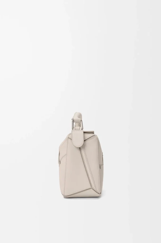 Bolso Panta pequeño Puzzle en piel de becerro brillante Light Ghost Bolso Panta pequeño Puzzle en piel de becerro brillante Light Ghost
