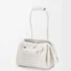 Bolso pequeño Madrid en piel de becerro granulada suave Soft White. Bolso pequeño Madrid en piel de becerro granulada suave Soft White.