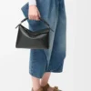 Bolso pequeño Puzzle Edge en piel de becerro clásica negro Bolso pequeño Puzzle Edge en piel de becerro clásica negro