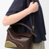 Bolso pequeño Puzzle Edge Landscape en piel de becerro napa chocolate/musgo claro Bolso pequeño Puzzle Edge Landscape en piel de becerro napa chocolate/musgo claro