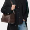 Bolso Puzzle Biker grande en piel de becerro brillante color castaño oscuro Bolso Puzzle Biker grande en piel de becerro brillante color castaño oscuro