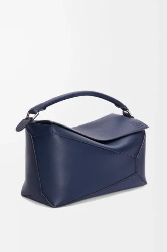 Bolso Puzzle Edge grande en piel de becerro clásica azul abismo