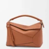 Bolso Puzzle Edge grande en piel de becerro clásica color tostado Bolso Puzzle Edge grande en piel de becerro clásica color tostado