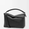 Bolso Puzzle Edge grande en piel de becerro granulada, color negro Bolso Puzzle Edge grande en piel de becerro granulada, color negro