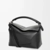 Bolso Puzzle Edge mediano en piel de becerro clásica, color negro Bolso Puzzle Edge mediano en piel de becerro clásica, color negro