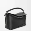 Bolso Puzzle Edge mediano en piel de becerro clásica, color negro Bolso Puzzle Edge mediano en piel de becerro clásica, color negro