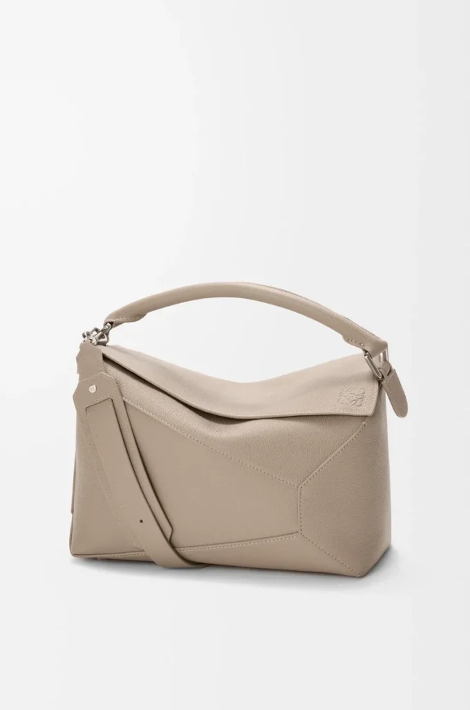 Bolso Puzzle Edge mediano en piel de becerro granulada suave color arcilla Bolso Puzzle Edge mediano en piel de becerro granulada suave color arcilla