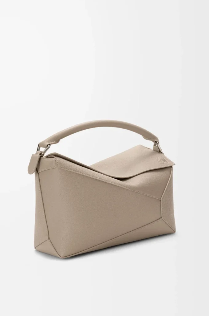 Bolso Puzzle Edge mediano en piel de becerro granulada suave color arcilla Bolso Puzzle Edge mediano en piel de becerro granulada suave color arcilla