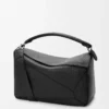 Bolso Puzzle grande en piel de becerro granulada flexible, color negro Bolso Puzzle grande en piel de becerro granulada flexible, color negro