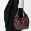 Bolso Squeeze mediano en piel de cordero napa suave Burdeos oscuro Bolso Squeeze mediano en piel de cordero napa suave Burdeos oscuro