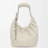 Bolso Squeeze pequeño en piel de cordero napa suave color sal marina Bolso Squeeze pequeño en piel de cordero napa suave color sal marina