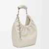 Bolso Squeeze pequeño en piel de cordero napa suave color sal marina Bolso Squeeze pequeño en piel de cordero napa suave color sal marina