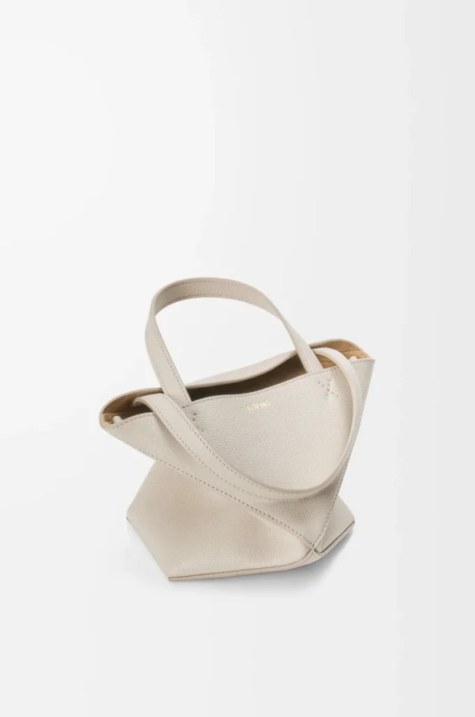 Bolso tote Mini Puzzle Fold en piel de becerro granulada suave Light Ghost Bolso tote Mini Puzzle Fold en piel de becerro granulada suave Light Ghost